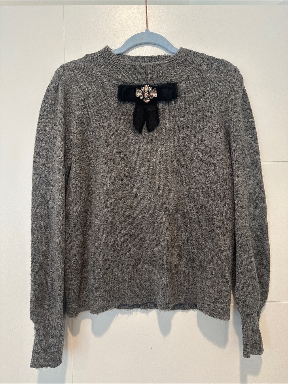 CeCe Gray Crewneck Sweater with Black Bow and Jewel
